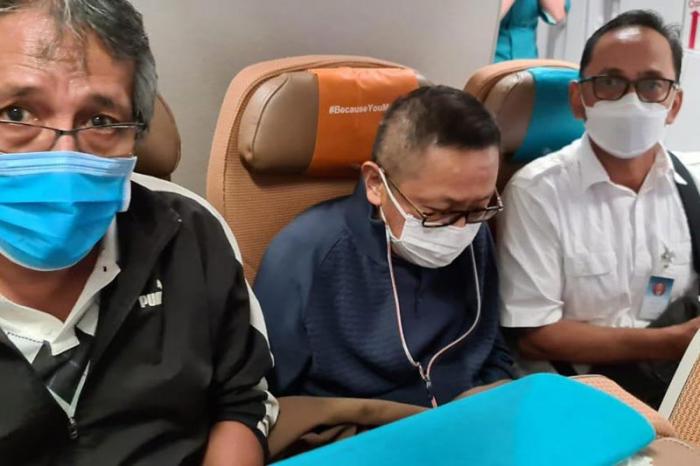 Buronan kasus pembalakan liar hutan, Adelin Lis dikawal petugas dipulangkan menuju Indonesia dari Singapura, Sabtu (19/6/2021).