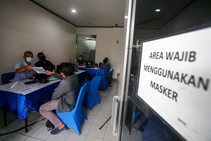 Direktur Utama MNC SKY Vision Hari Susanto memberikan sambutan saat membuka sentra vaksinasi Covid-19 dosis kedua di MNC Vision Tower, Selasa (3/8/2021).