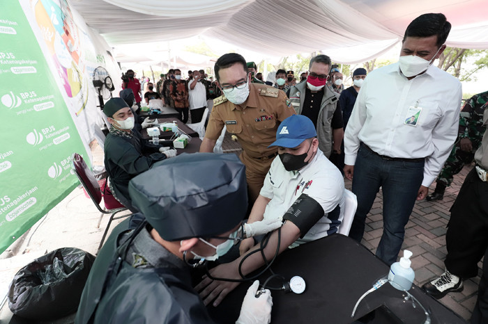 Kegiatan bertajuk Vaksinasi Bersama BP Jamsostek di Kawasan Industri Suryacipta, Karawang, Jawa Barat, Senin (9/8/2021).