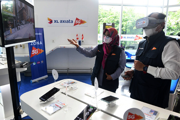 Demo layanan 5G yang tersedia di XL Center, XL Axiata Tower, Jakarta, Rabu (18/8/2021).