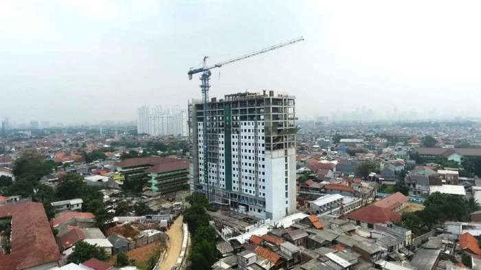 Topping Off proyek Revitalisasi Rusun Cipinang Besar Utara (Cibesut), Jakarta Timur, Selasa, (31/8/2021).