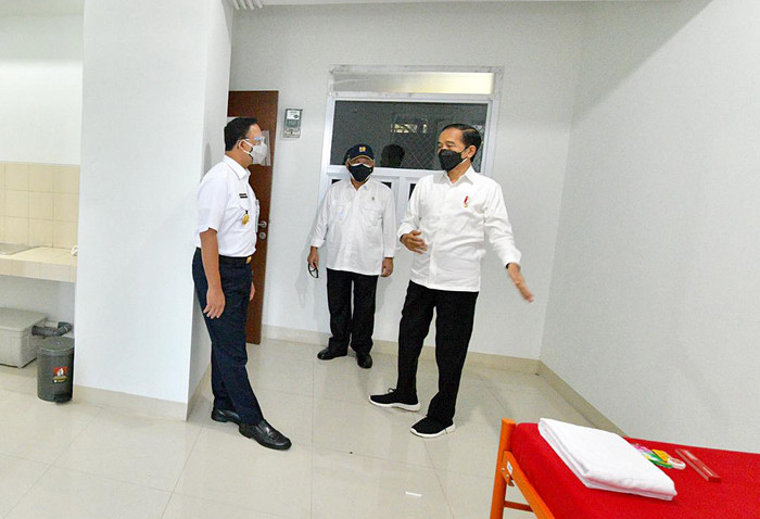 Presiden Joko Widodo saat meresmikan Rumah Susun Pasar Rumput beserta kios pasar dan fasilitas penunjang lainnya di Jakarta Selatan, Senin (20/9/2021).