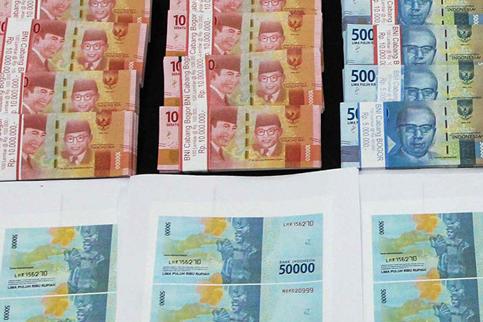 Rilis pengungkapan kejahatan uang palsu di Bareskrim Mabes Polri, Jakarta, Kamis (23/9/2021).
