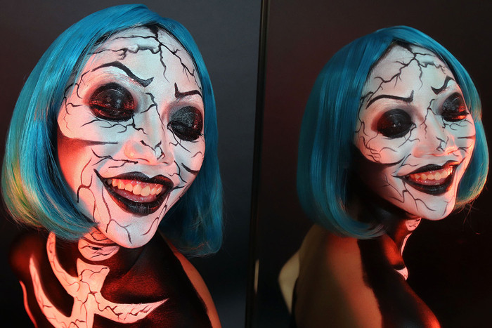 Model tampil dengan riasan menyeramkan ketika mengikuti kompetisi Viva Halloween Body Painting secara virtual, di Surabaya, Jawa Timur, Minggu (31/10/2021).