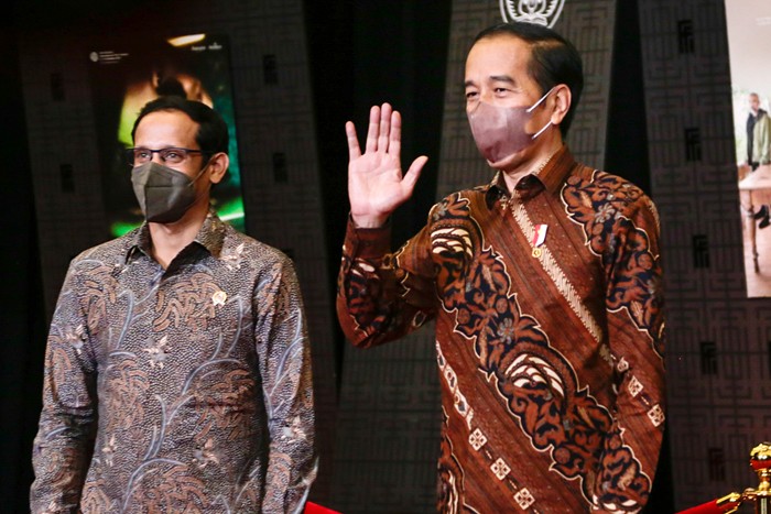 Presiden Joko Widodo saat tiba di gelaran Festival Film Indonesia (FFI) 2021 di JCC Senayan, Jakarta Pusat, Rabu (10/11/2021).
