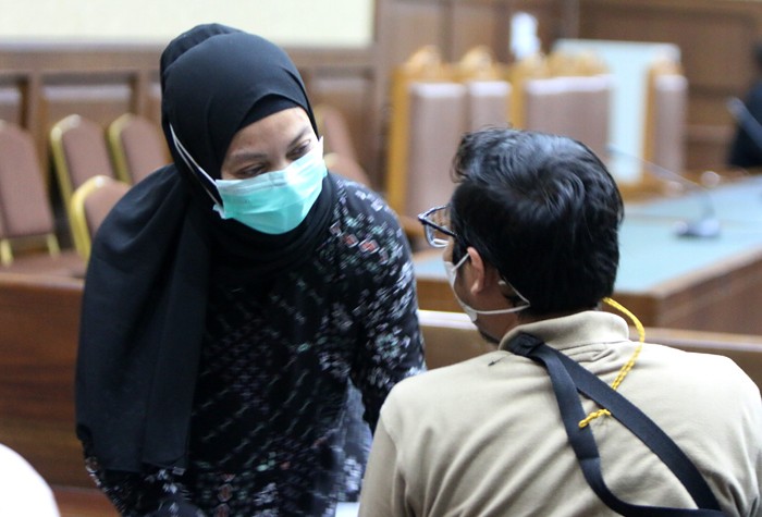 Terdakwa Direktur Utama PT Jazmina Asri Kreasi Jasmina Julie Fatima mengikuti sdang lanjutan di Pengadilan Tipikor, Jakarta, Selasa (23/11/2021).