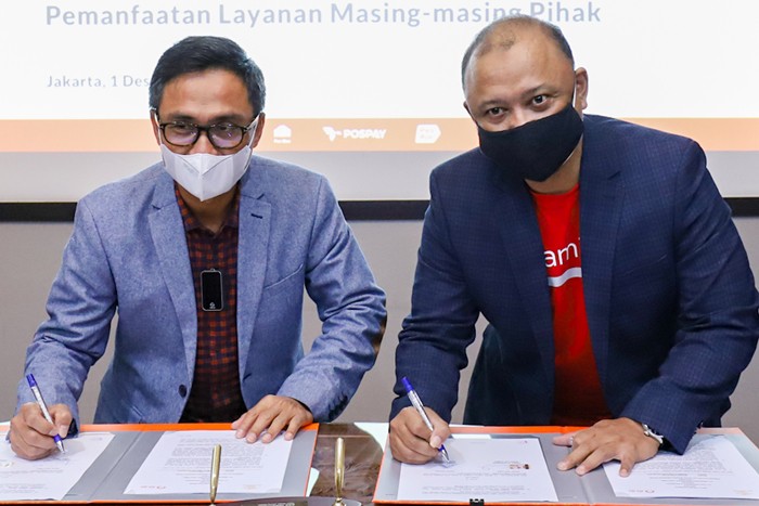 Penandatanganan nota kesepahaman untuk memberikan solusi dalam layanan kurir, logistik dan sistem pembayaran, di Jakarta, Rabu (1/12/2021).