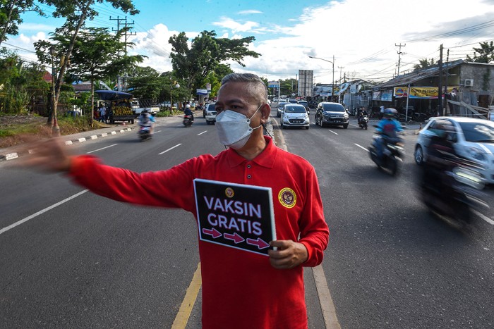 Badan Intelijen Negara (BIN) Daerah Sumatera Selatan turun ke jalan mengajak warga untuk Vaksin Covid-19 di Jalan Demang Lebar Daun Palembang.