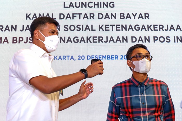 Peluncuran kanal daftar dan Bayar Iuran Jaminan Sosial Ketenagakerjaan di Pos Bloc Jakarta, Senin (20/12/2021).