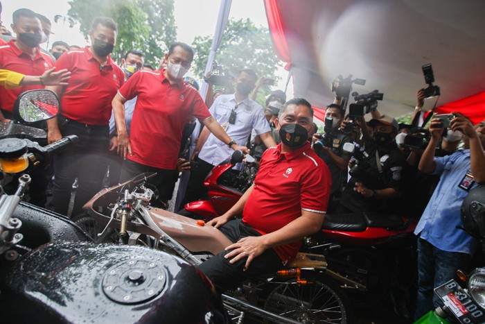 treet Race Polda Metro Jaya di Jalan Inspeksi Kali Ancol, Jakarta Utara, Minggu (16/1/2022).