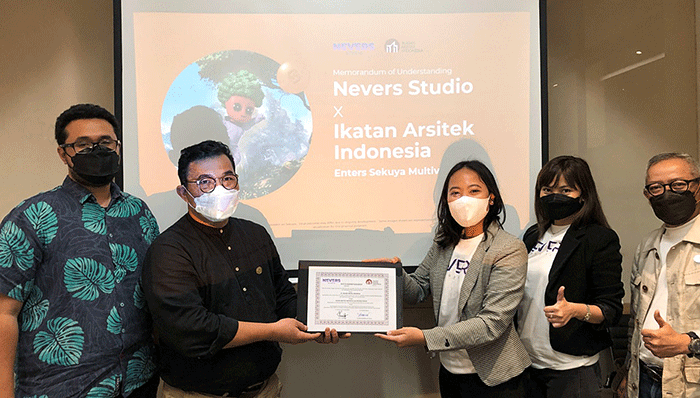 Ketua IAI Bekasi, Ar. Dedi Budiman (kiri) dan CEO Nevers Studio, Lilis Huri berfoto bersama usai penandatanganan nota kesepakatan.