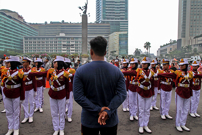 Aksi sejumlah polisi cilik (Pocil) di kawasan Car Free Day (CFD) kawasan Bundaran HI, Jakarta, Minggu (3/7/2022).