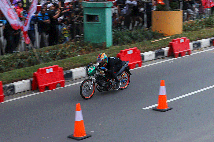 Sejumlah peserta saat mengikuti gelaran Street Race Polda Metro Jaya (PMJ) di Jalan Benyamin Sueb, Kemayoran, Jakarta Pusat, Sabtu (3/9/2022).