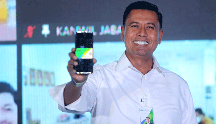 Kampanye kemudahan mendaftarkan pekerja informal (Bukan Penerima Upah) melalui aplikasi Jamsostek Mobile (JMO) di Jakarta.
