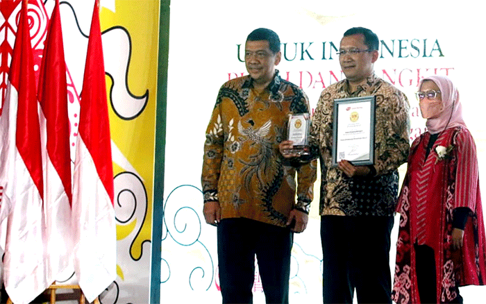 Direktur Utama PT Bank Tabungan Negara (Persero) Tbk. Haru Koesmahargyo meraih penghargaan sebagai Tokoh Pembiayaan Perumahan Rakyat.