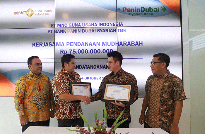 Penandatanganan kerja sama pembiayaan Mudharabah sebesar Rp75 miliar antara PT MNC Guna Usaha dengan PT Bank Panin Dubai Syariah Tbk (PNBS).