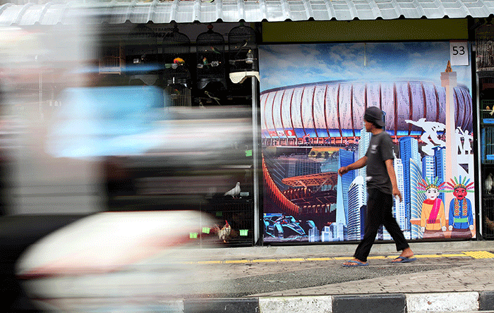 Para pedagang saat menunggu pembeli di pasar hewan Barito, Kebayoran Lama, Jakarta, Selasa (25/10/2022).
