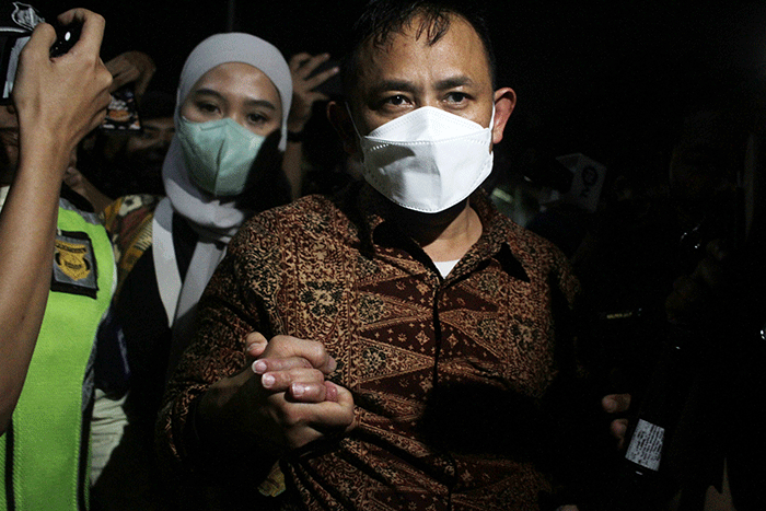 Kepala BPN Jakarta Timur Sudarman Harja Saputra usai menjalani pemeriksaan di Gedung Merah Putih KPK, Jakarta, Selasa  (21/3/2023).
