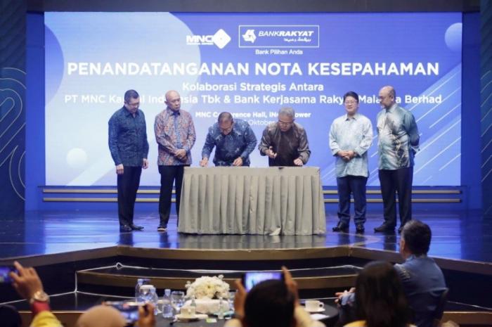 MNC Kapital dan Bank Rakyat menjalin kerja sama dalam meningkatkan layanan transaksi perbankan bagi pekerja migran Indonesia (PMI).